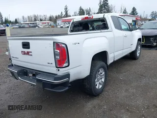 2016 GMC Canyon 4WD SLE with VIN 1GTH6CE34G1205461, listed as a IAAI auction lot 41869174 with 1 mi miles. Bid and sale history available at carsss.com. Image 4.