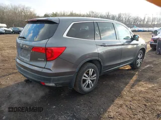 2016 Honda Pilot EX-L with VIN 5FNYF6H75GB053780, listed as a IAAI auction lot 41340590 with 203,190 mi miles. Bid and sale history available at carsss.com. Image 4.