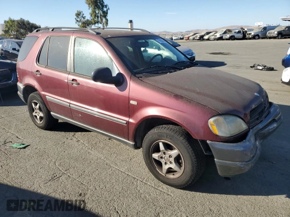 1999 Mercedes-Benz M-Class with VIN 4JGAB54E4XA101754, listed as a Copart auction lot 77903984 with 187,810 mi miles and Salvage Title. Bid and sale history available at carsss.com. Image 4.