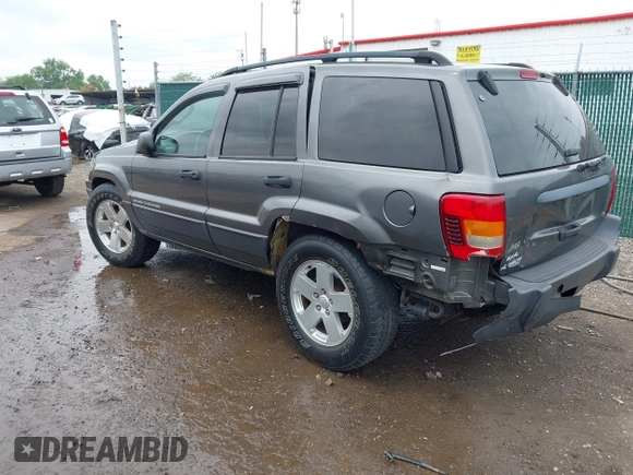 2003 Jeep Grand Cherokee Laredo z VIN 1J4GW48S73C545863, wystawiony jako IAAI lot #42222247 z przebiegiem 128 529 mil mil oraz . Historia ofert i sprzedaży dostępna na DreamBid. Obrazek 3.