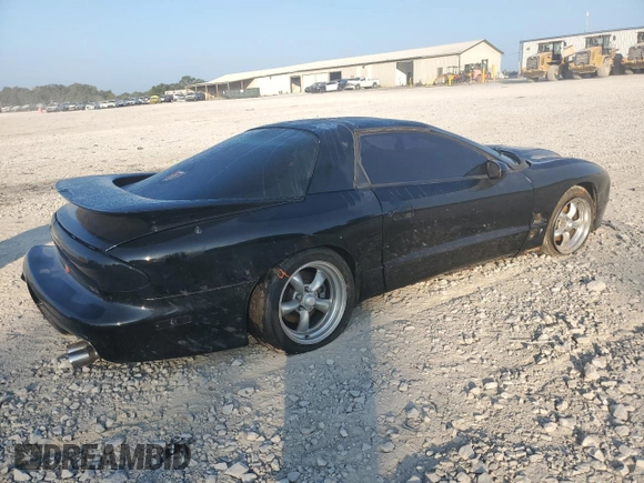 2000 Pontiac Firebird Formula z VIN 2G2FV22G4Y2175318, wystawiony jako Copart lot #68737224 z przebiegiem 229 394 mil mil oraz Szkoda całkowita • Salvage title. Historia ofert i sprzedaży dostępna na DreamBid. Obrazek 3.