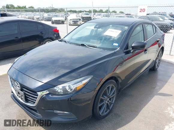 2018 Mazda 3 Touring with VIN 3MZBN1V32JM208914, listed as a IAAI auction lot 42066757 with 111,249 mi miles and . Bid and sale history available at DreamBid. Image 18.