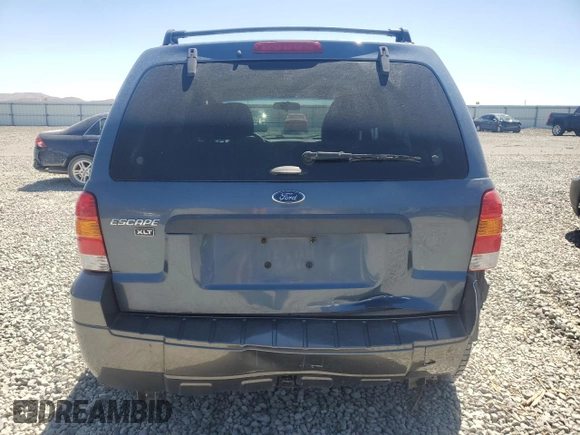 2005 Ford Escape XLT with VIN 1FMCU93105KA43061, listed as a Copart auction lot 62324555 with 121,517 mi miles and Salvage title. Bid and sale history available at DreamBid. Image 6.