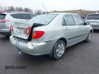 2003 Toyota Corolla CE with VIN 2T1BR32E13C051798, listed as a IAAI auction lot 42009353 with 153,941 mi miles and . Bid and sale history available at DreamBid. Image 4.