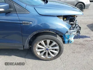 2018 Ford Escape Titanium with VIN 1FMCU9J92JUB01162, listed as a IAAI auction lot 42495112 with 96,280 mi miles and . Bid and sale history available at DreamBid. Image 19.