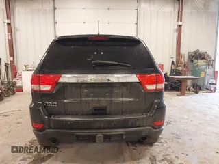 2012 Jeep Grand Cherokee Laredo with VIN 1C4RJFAT1CC225479, listed as a IAAI auction lot 41709911 with 227,150 mi miles. Bid and sale history available at carsss.com. Image 16.