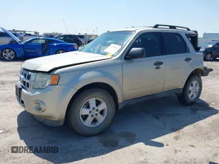 2012 Ford Escape XLT z VIN 1FMCU0DG6CKB90979, wystawiony jako IAAI lot #41972124 z przebiegiem Nie podano mil oraz . Historia ofert i sprzedaży dostępna na DreamBid. Obrazek 2.