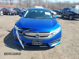 2017 Honda Civic LX z VIN 19XFC2F54HE203525, wystawiony jako IAAI lot #41796081 z przebiegiem 82 910 mil mil oraz . Historia ofert i sprzedaży dostępna na DreamBid. Obrazek 12.