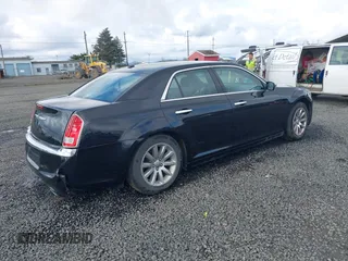 2012 Chrysler 300 Limited with VIN 2C3CCACG0CH263449, listed as a IAAI auction lot 41829134 with 157,108 mi miles. Bid and sale history available at carsss.com. Image 4.