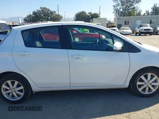 2015 Toyota Yaris L with VIN VNKKTUD34FA051863, listed as a IAAI auction lot 41615246 with 103,728 mi miles. Bid and sale history available at carsss.com. Image 13.