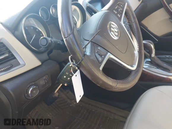 2014 Buick Verano with VIN 1G4PP5SK0E4148148, listed as a IAAI auction lot 42006643 with 113,948 mi miles and . Bid and sale history available at carsss.com. Image 11.