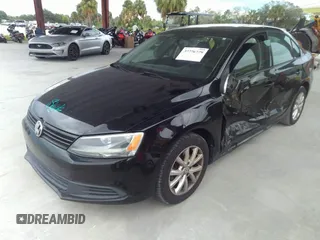 2011 Volkswagen Jetta Sedan SE with VIN 3VWDX7AJ7BM390282, listed as a IAAI auction lot 41673478 with 196,094 mi miles. Bid and sale history available at carsss.com. Image 2.