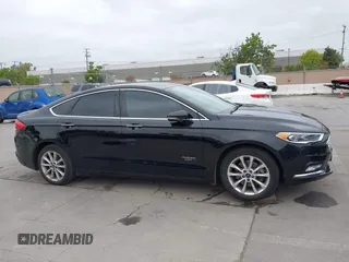 2017 Ford Fusion Titanium with VIN 3FA6P0SUXHR110304, listed as a IAAI auction lot 42119565 with 118,706 mi miles and . Bid and sale history available at DreamBid. Image 13.