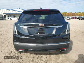2021 Cadillac XT5 AWD Sport with VIN 1GYKNHRS3MZ103180, listed as a Copart auction lot 77166714 with 17,659 mi miles and Salvage title. Bid and sale history available at DreamBid. Image 6.