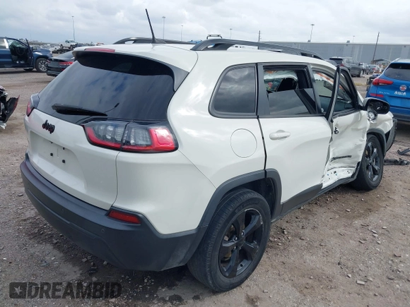 2019 Jeep Cherokee Latitude Plus with VIN 1C4PJLLBXKD405322, listed as a IAAI auction lot 41708104 with 93,295 mi miles and . Bid and sale history available at DreamBid. Image 4.