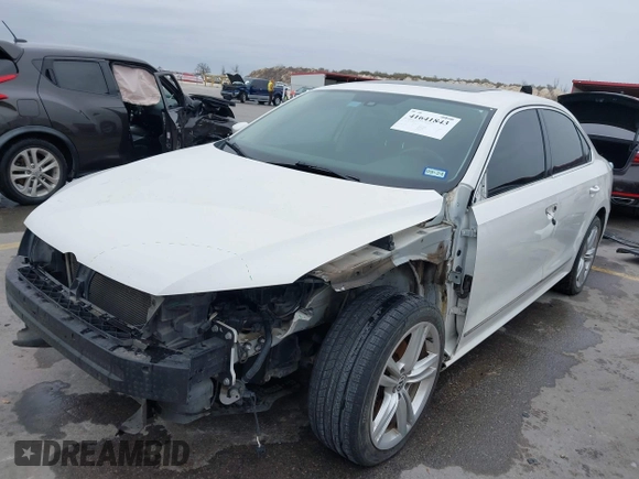 2014 Volkswagen Passat TDI SEL Premium with VIN 1VWCN7A32EC035738, listed as a IAAI auction lot 41641843 with 151,159 mi miles. Bid and sale history available at carsss.com. Image 2.