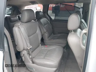 2004 Toyota Sienna XLE with VIN 5TDZA22C94S084569, listed as a IAAI auction lot 41482040 with 210,157 mi miles and . Bid and sale history available at DreamBid. Image 8.