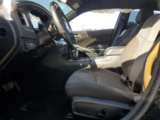 2019 Dodge Charger SXT with VIN 2C3CDXJG8KH757818, listed as a Copart auction lot 49518475 with 98,129 mi miles and Salvage Title. Bid and sale history available at DreamBid. Image 7.