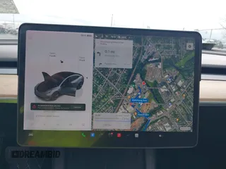 2022 Tesla Model 3 Long Range with VIN 5YJ3E1EB9NF206943, listed as a IAAI auction lot 41911040 with 69,920 mi miles and . Bid and sale history available at DreamBid. Image 18.
