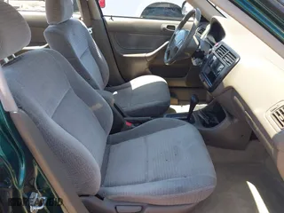 1999 Honda Civic VP with VIN 2HGEJ6611XH540017, listed as a IAAI auction lot 42093222 with 154,261 mi miles. Bid and sale history available at carsss.com. Image 5.