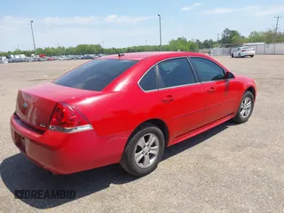 2013 Chevrolet Impala LS with VIN 2G1WF5E31D1179919, listed as a IAAI auction lot 42058911 with 191,263 mi miles and . Bid and sale history available at DreamBid. Image 4.