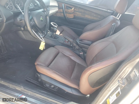 2011 BMW 1 Series 135i with VIN WBAUC9C5XBVM10215, listed as a Copart auction lot 41676675 with 0 mi miles and Clean Title. Bid and sale history available at carsss.com. Image 7.