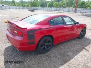 2013 Dodge Charger RT with VIN 2C3CDXCT7DH647923, listed as a IAAI auction lot 41934831 with 136,015 mi miles. Bid and sale history available at carsss.com. Image 4.
