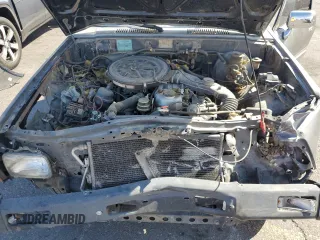 1987 Toyota Pickup with VIN JT4RN50R5H0228706, listed as a Copart auction lot 50639045 with 296,043 mi miles and Salvage Title. Bid and sale history available at DreamBid. Image 11.