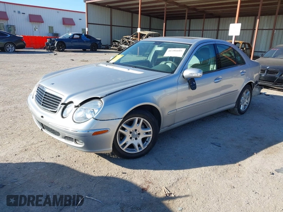 2006 Mercedes-Benz E-Class 3.5L with VIN WDBUF56J86A795135, listed as a IAAI auction lot 41286605 with 162,463 mi miles. Bid and sale history available at carsss.com. Image 17.