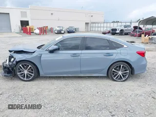 2023 Honda Civic Touring z VIN 2HGFE1F95PH325015, wystawiony jako IAAI lot #41796024 z przebiegiem 39 333 mil mil oraz . Historia ofert i sprzedaży dostępna na DreamBid. Obrazek 15.