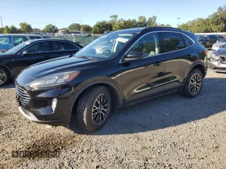 2021 Ford Escape Titanium Plug-In Hybrid z VIN 1FMCU0LZ5MUA67022, wystawiony jako Copart lot #72312734 z przebiegiem 49 505 mil mil oraz Szkoda całkowita • Salvage title. Historia ofert i sprzedaży dostępna na DreamBid. Obrazek 1.