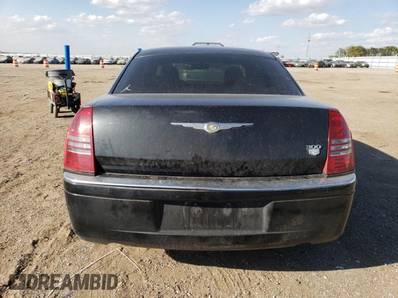 2006 Chrysler 300 C with VIN 2C3KA63H06H272552, listed as a Copart auction lot 72185684 with 105,737 mi miles and Salvage Title. Bid and sale history available at carsss.com. Image 6.
