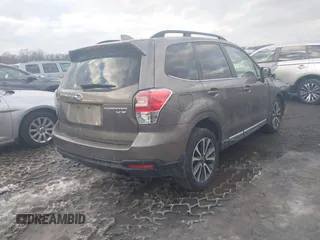 2017 Subaru Forester Touring with VIN JF2SJGWC1HH581460, listed as a IAAI auction lot 41326532 with 59,454 mi miles. Bid and sale history available at carsss.com. Image 4.