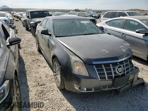 2012 Cadillac CTS Premium z VIN 1G6DS5E35C0128558, wystawiony jako Copart lot #65431155 z przebiegiem 186 593 mil mil oraz Szkoda całkowita • Salvage title. Historia ofert i sprzedaży dostępna na DreamBid. Obrazek 13.