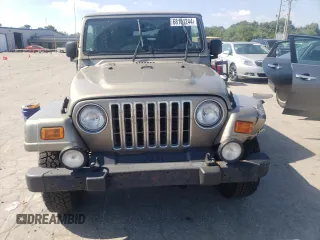 2003 Jeep Wrangler Sahara with VIN 1J4FA59S23P303845, listed as a Copart auction lot 68101244 with 141,753 mi miles and Clean Title. Bid and sale history available at carsss.com. Image 5.