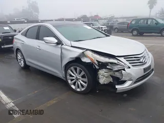 2014 Hyundai Azera Limited with VIN KMHFH4JG7EA388931, listed as a IAAI auction lot 41468407 with 130,597 mi miles and . Bid and sale history available at carsss.com. Image 1.