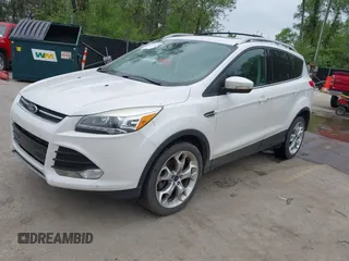 2016 Ford Escape Titanium with VIN 1FMCU9J96GUB97564, listed as a IAAI auction lot 42137663 with 269,009 mi miles. Bid and sale history available at carsss.com. Image 17.