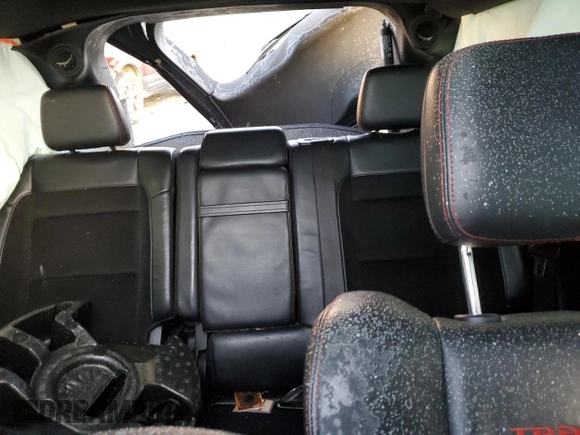 2017 Jeep Grand Cherokee Trailhawk with VIN 1C4RJFLT0HC694583, listed as a Copart auction lot 84421734 with 116,772 mi miles and Salvage title. Bid and sale history available at DreamBid. Image 10.