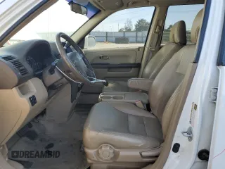 2005 Honda CR-V EX SE with VIN JHLRD789X5C032227, listed as a Copart auction lot 52847815 with 302,341 mi miles and Salvage Title. Bid and sale history available at carsss.com. Image 7.