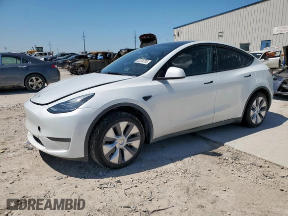 2023 Tesla Model Y Long Range z VIN 7SAYGDEE1PA155629, wystawiony jako Copart lot #52234735 z przebiegiem 24 944 mil mil oraz Szkoda całkowita • Salvage title. Historia ofert i sprzedaży dostępna na DreamBid. Obrazek 1.