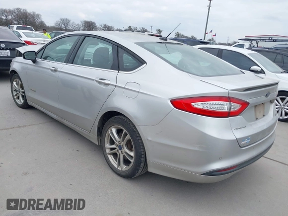 2016 Ford Fusion SE Hybrid with VIN 3FA6P0LU2GR340755, listed as a IAAI auction lot 41673932 with 191,650 mi miles. Bid and sale history available at carsss.com. Image 3.