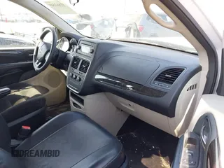 2016 Dodge Grand Caravan SE with VIN 2C4RDGBG1GR392484, listed as a IAAI auction lot 41663549 with 126,882 mi miles and . Bid and sale history available at DreamBid. Image 5.