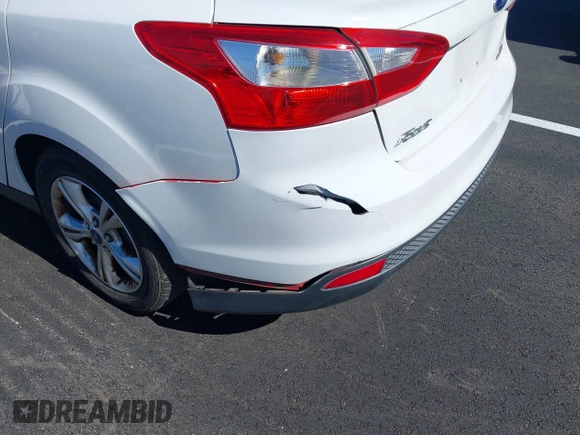 2013 Ford Focus SE with VIN 1FADP3F22DL265312, listed as a IAAI auction lot 41872863 with 217,052 mi miles. Bid and sale history available at carsss.com. Image 6.