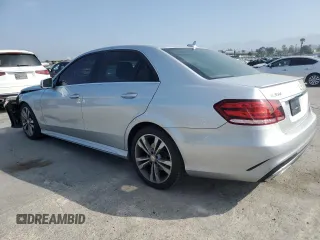 2016 Mercedes-Benz E 350 Sport with VIN WDDHF5KB6GB251770, listed as a Copart auction lot 53671275 with 118,704 mi miles and Salvage title. Bid and sale history available at DreamBid. Image 2.
