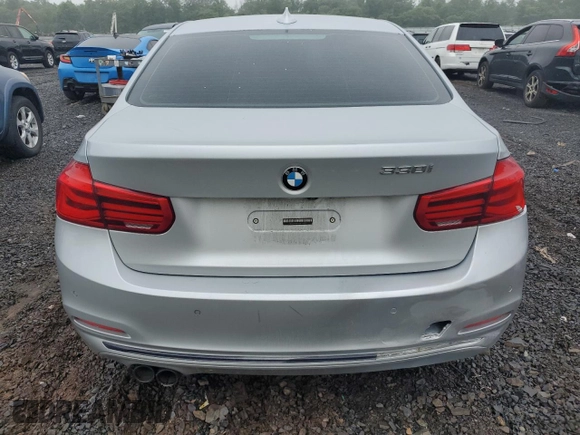 2018 BMW 3 Series 330i with VIN WBA8B9G50JNU98561, listed as a Copart auction lot 61293325 with 106,656 mi miles and Clean title. Bid and sale history available at DreamBid. Image 6.