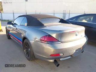 2006 BMW 6 Series 650Ci z VIN WBAEK13416CN77872, wystawiony jako IAAI lot #41648498 z przebiegiem 142 598 mil mil oraz . Historia ofert i sprzedaży dostępna na DreamBid. Obrazek 3.