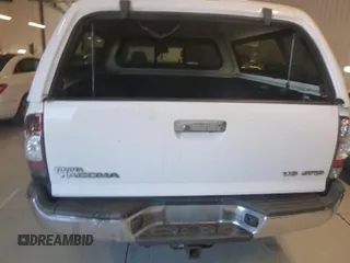2013 Toyota Tacoma with VIN 3TMMU4FN6DM062201, listed as a IAAI auction lot 42906789 with 266,431 mi miles and . Bid and sale history available at DreamBid. Image 2.