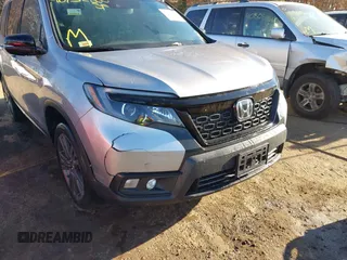 2021 Honda Passport EX-L with VIN 5FNYF8H54MB042677, listed as a IAAI auction lot 40732860 with 63,698 mi miles and . Bid and sale history available at DreamBid. Image 6.