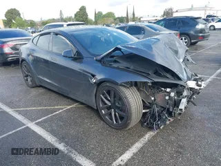 2022 Tesla Model S with VIN 5YJSA1E59NF493251, listed as a IAAI auction lot 41636337 with Not provided miles and . Bid and sale history available at DreamBid. Image 1.