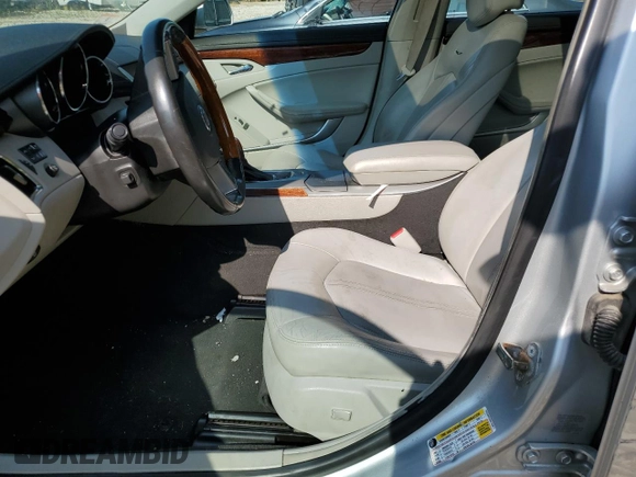 2010 Cadillac CTS Performance z VIN 1G6DM8EG9A0126811, wystawiony jako Copart lot #71155534 z przebiegiem 146 947 mil mil oraz Szkoda całkowita • Salvage title. Historia ofert i sprzedaży dostępna na DreamBid. Obrazek 7.
